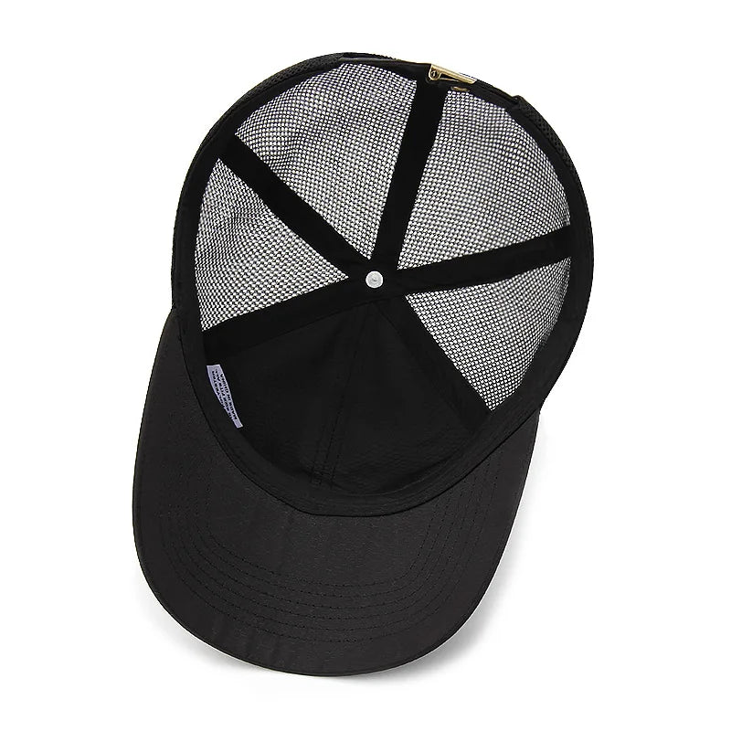 Black baseball cap with mesh back on a white background