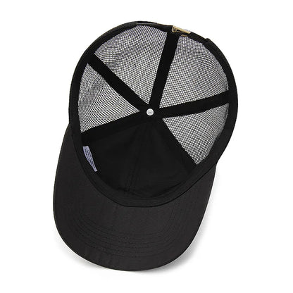 Black baseball cap with mesh back on a white background