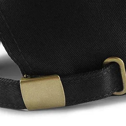 Black cap with metal adjustable buckle strap and cotton sweatband, close-up view.